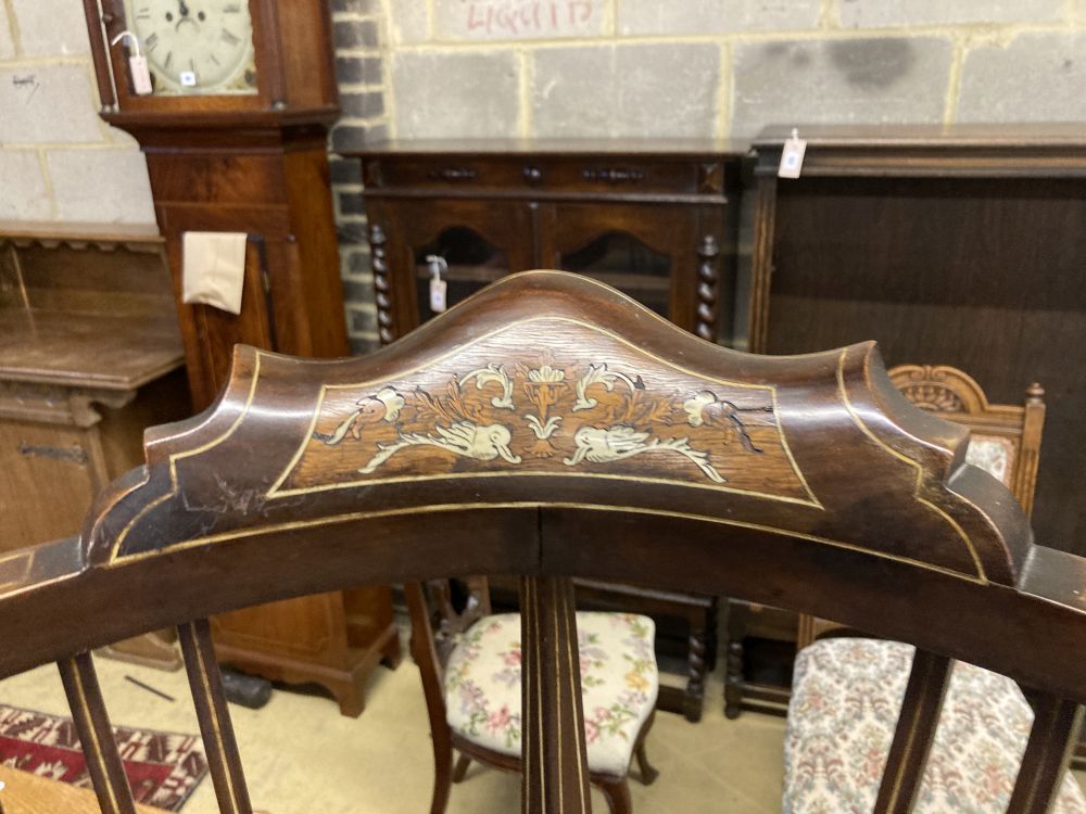 A Victorian inlaid mahogany corner elbow chair